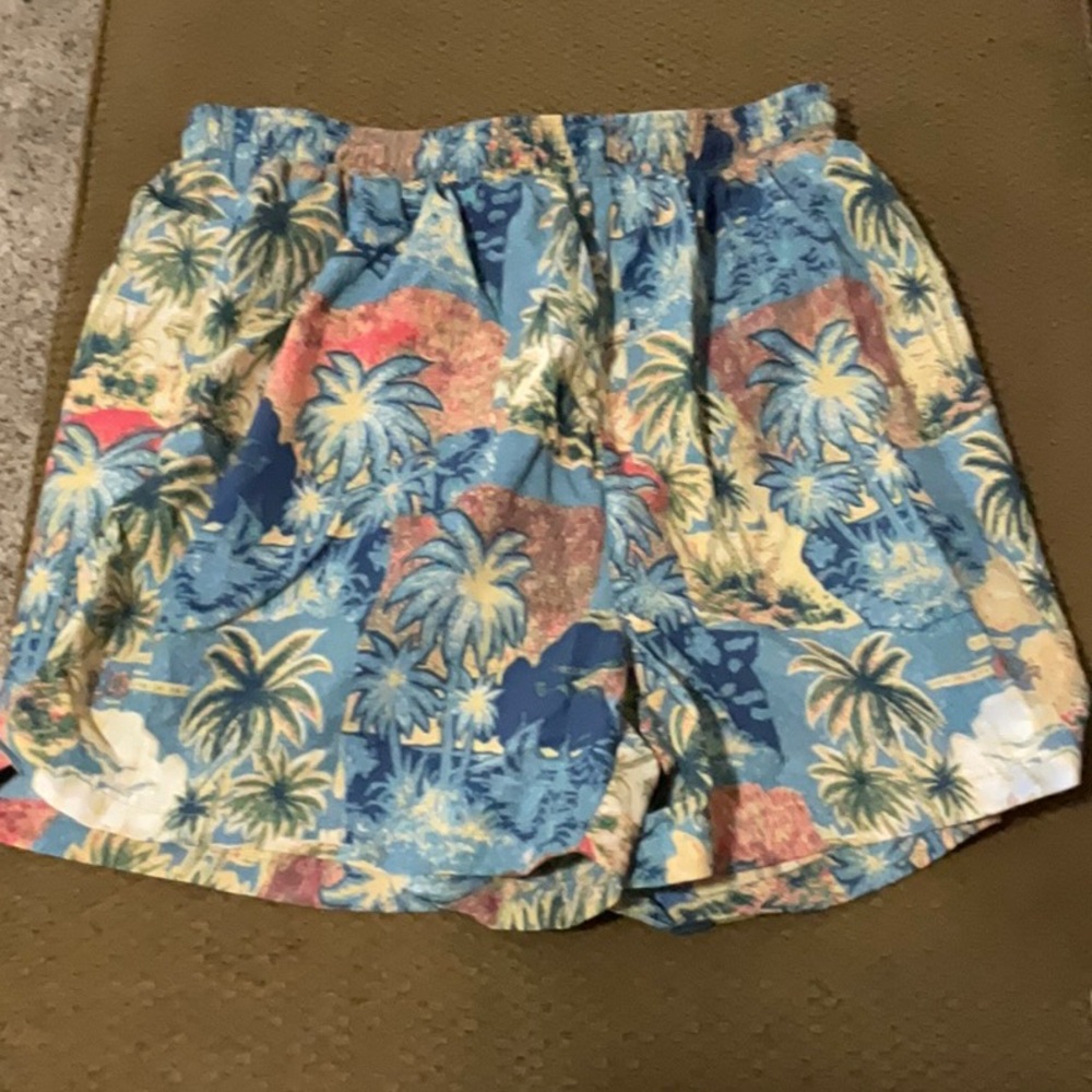 Greg Norman Collection Blue and Red Swim Trunks Vibrant Design